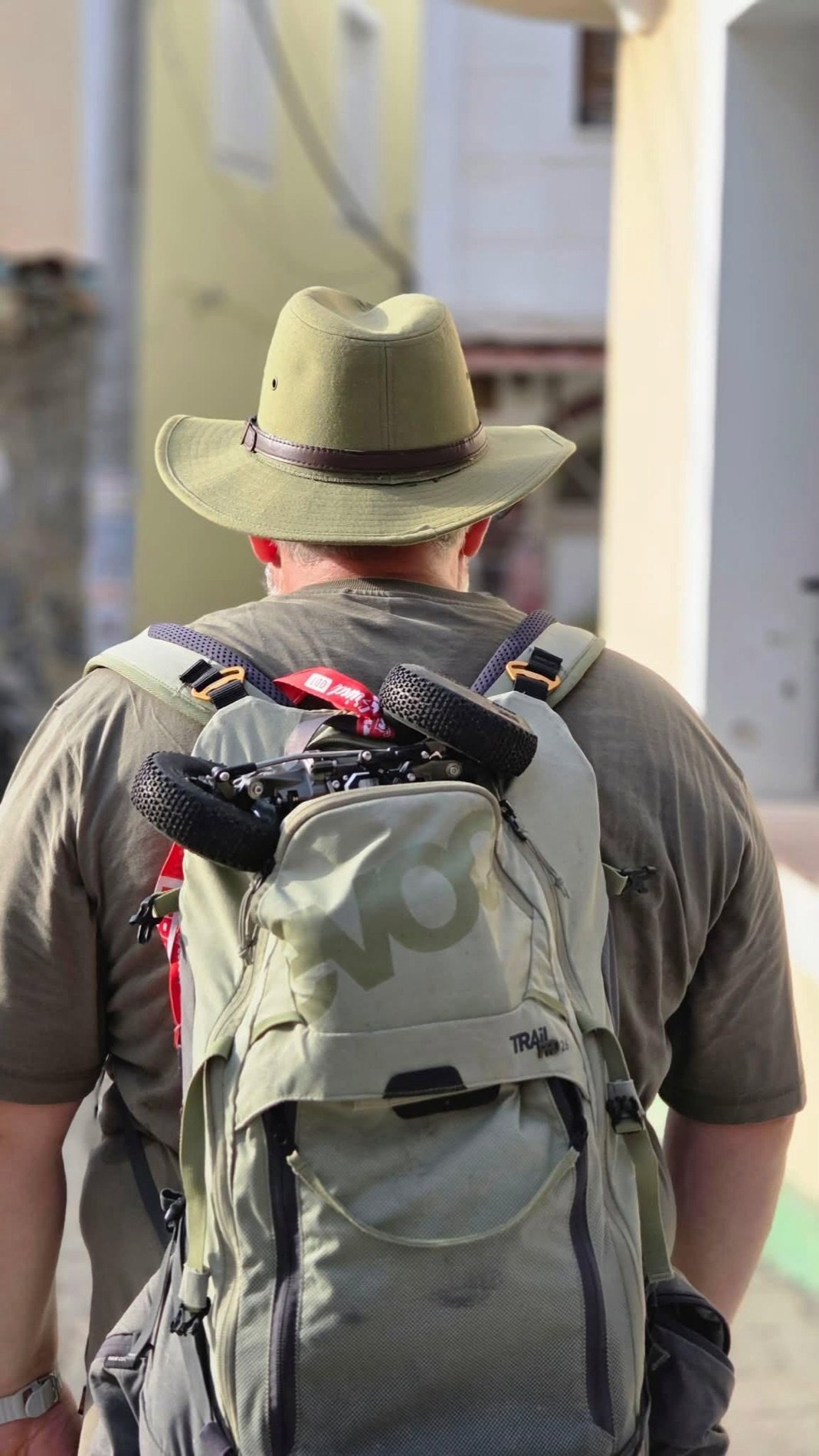 A 9C crawler strapped to a hiking backpack on the walk in